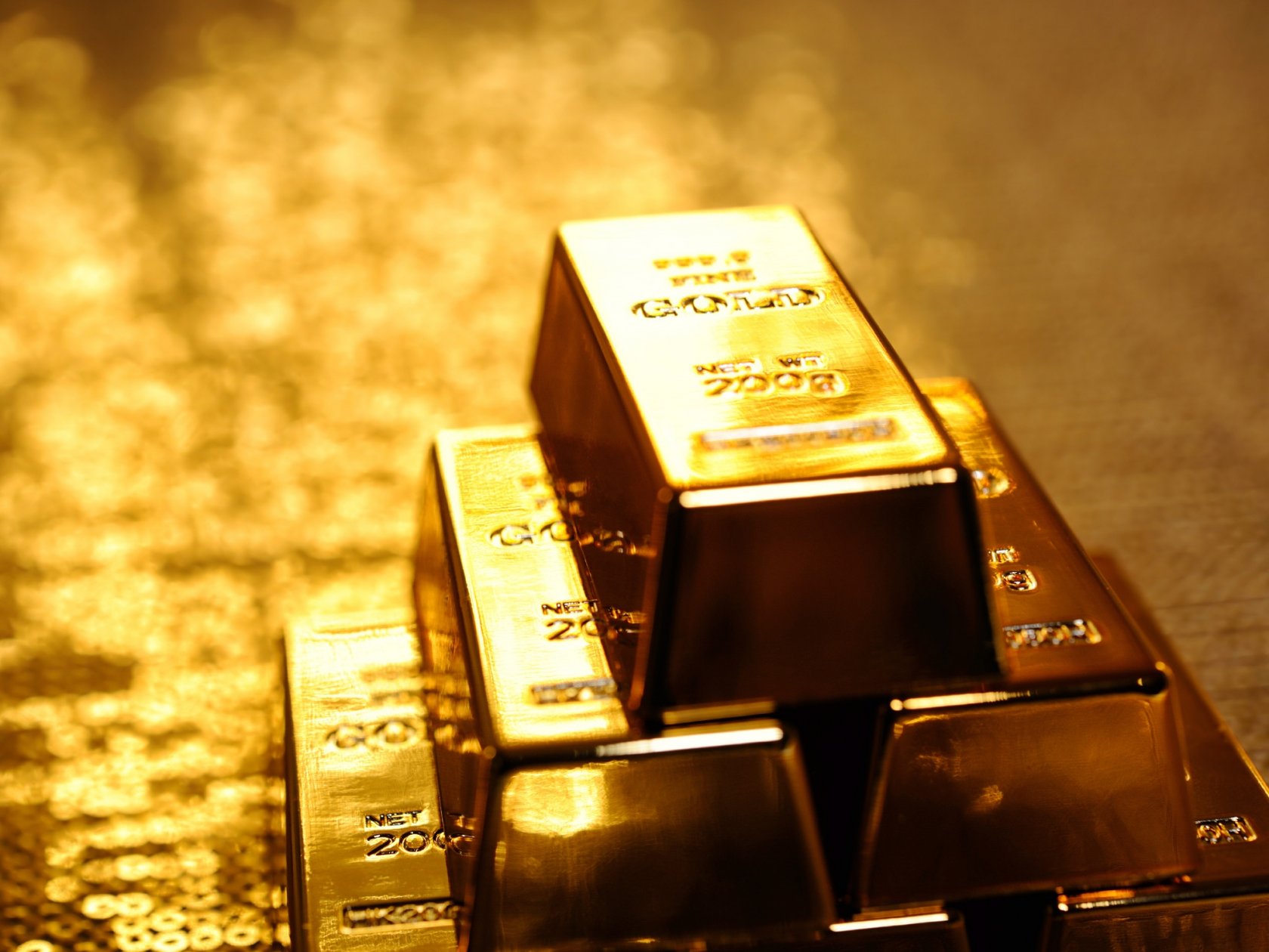 Выгодно ли инвестировать в золото?